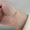 Armband i 18k guld med krans och kristaller