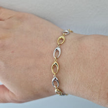  Armband två färgat guld ovala ringar
