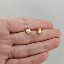  Pärlörhängen i 18k guld
