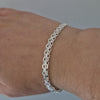 X-länk armband utan stav. Tillverkad i äkta silver 925. Glänsande och fin i design. Passar alla tillfällen.