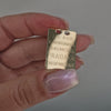 Pradaxa bricka i 18k guld