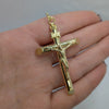 stort guldkors med Jesus i 18k guld