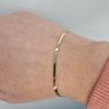 Armband manglad 18k guld