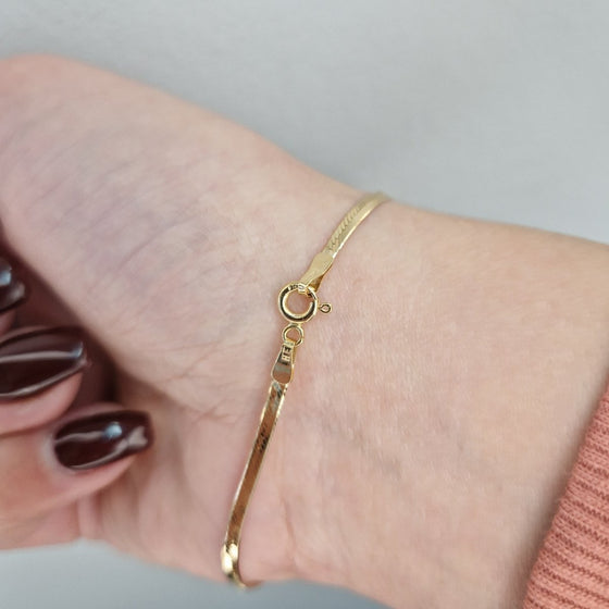 Armband manglad 18k guld