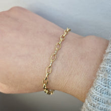  Armband i 18k guld med ovala ringar