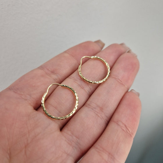 Creoler facetterade design 18k guld