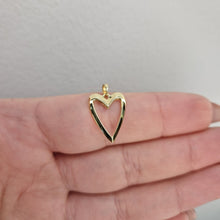  Hängsmycke genombrutet hjärta 18k guld