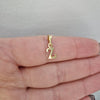 Mindre bokstav i 18k guld